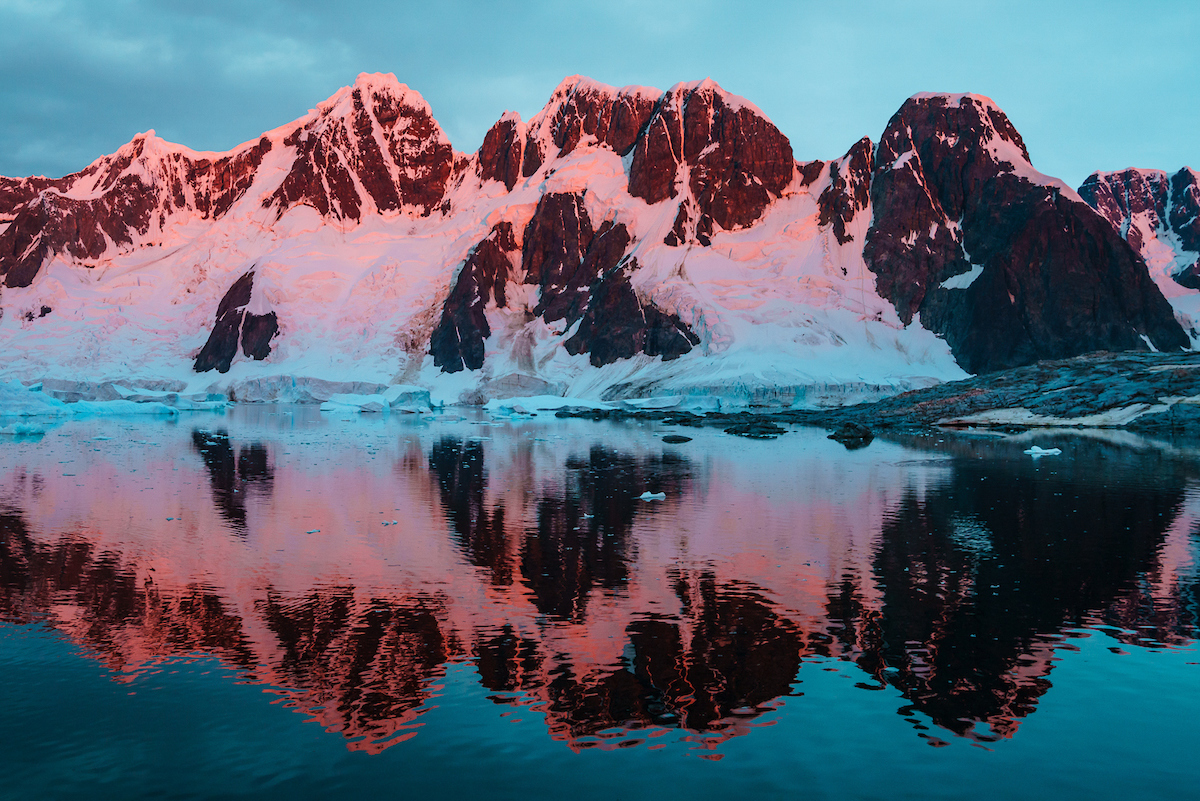 Fiery sunset in Antarctica. Click to read the article 'We Cannot Make Money on a Dead Planet,' by Cristina Mittermeier